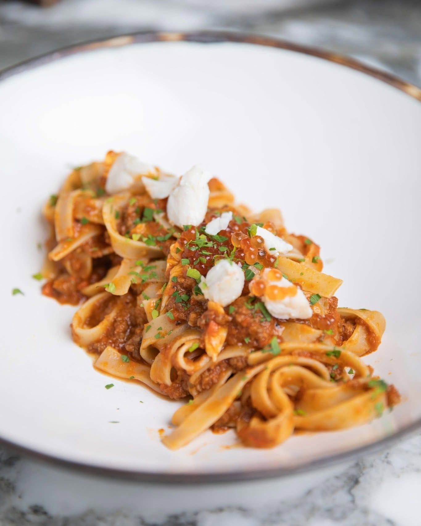 BEEF BOLOGNESE CRAB FETTUCCINE